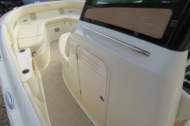 Slide: The Image of 2025 Chris-Craft Catalina 28 boat interior with seating and storage. - 33
