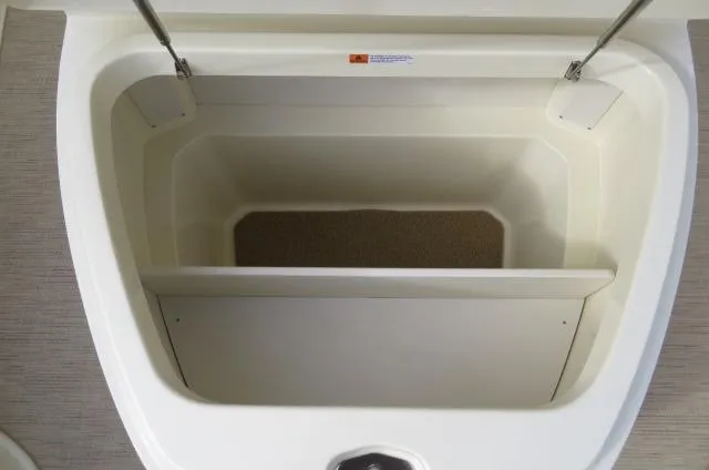 Slide: The Image of Open storage compartment on 2025 Chris-Craft Catalina 28 boat. - 35