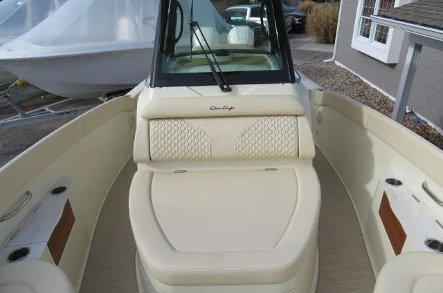 Slide: The Image of 2025 Chris-Craft Catalina 28 boat interior with beige seating and modern design. - 36