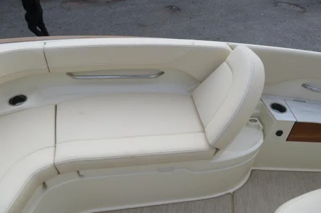 Slide: The Image of 2025 Chris-Craft Catalina 28 boat with luxurious cream seating and cup holders. - 41