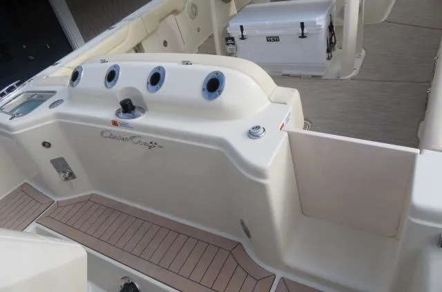 Slide: The Image of 2025 Chris-Craft Catalina 28 boat interior with seating and storage compartments. - 5