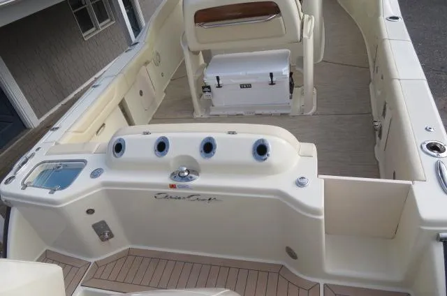 Slide: The Image of 2025 Chris-Craft Catalina 28 boat interior with seating and storage features. - 7