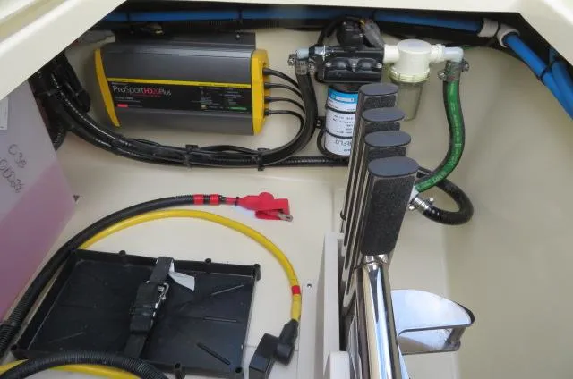 Slide: The Image of Engine compartment of 2025 Chris-Craft Catalina 28 with wiring and components. - 8