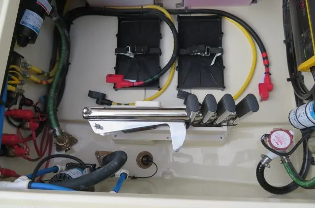 Slide: The Image of Engine compartment of 2025 Chris-Craft Catalina 28 with batteries and wiring. - 9