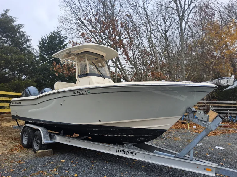 Slide: The Image of 2022 Grady-White Fisherman 257 boat on trailer, parked outdoors. - 0