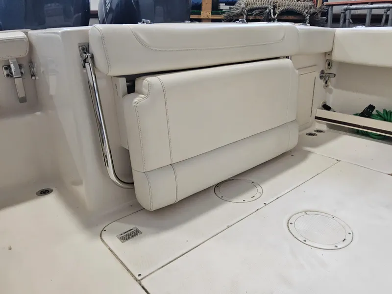 Slide: The Image of 2022 Grady-White Fisherman 257 boat interior with foldable seat and storage. - 15