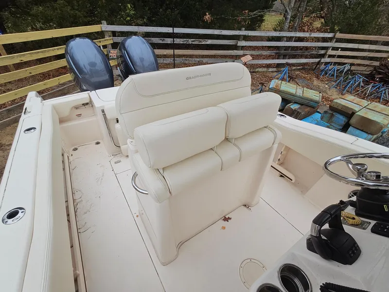 Slide: The Image of 2022 Grady-White Fisherman 257 boat interior with dual engines and seating. - 4
