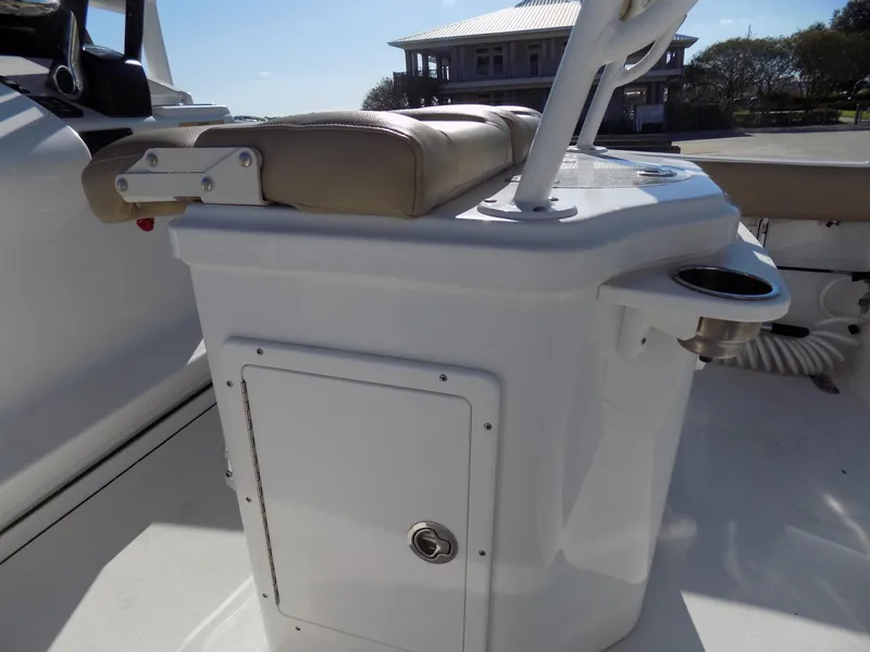Slide: The Image of 2017 Sportsman Heritage 251 Center Console boat seating and storage area. - 21