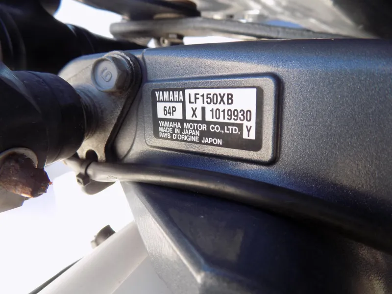Slide: The Image of Yamaha LF150X motor label on 2017 Sportsman Heritage 251 Center Console. - 23