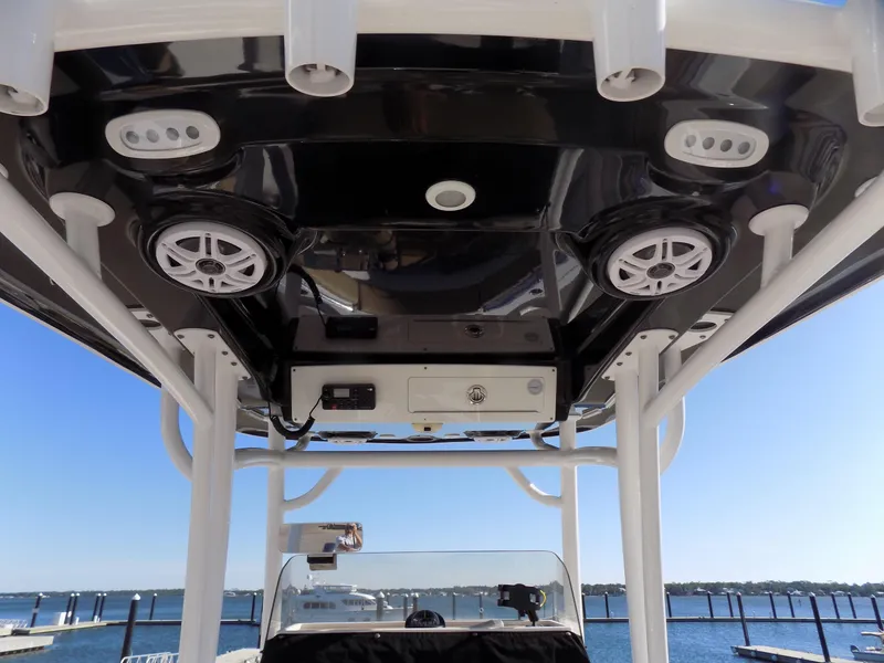 Slide: The Image of 2017 Sportsman Heritage 251 Center Console boat interior with speakers and electronics. - 7