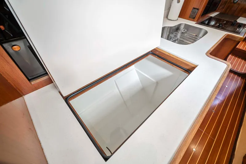 Slide: The Image of Pearson 530 yacht kitchen interior, 1981 model, featuring sink and countertop. - 13
