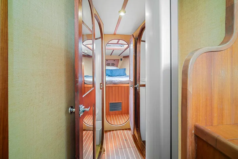Slide: The Image of Interior of 1981 Pearson 530 yacht with wooden finishes and cozy cabin. - 22
