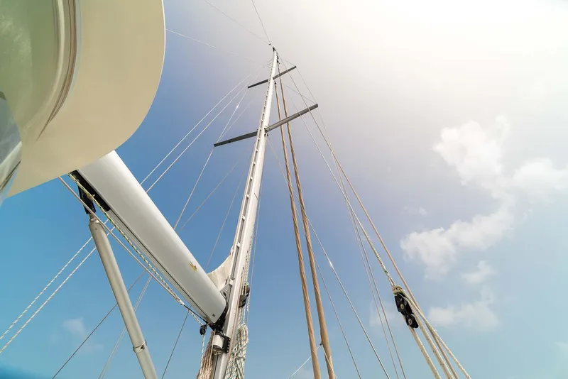 Slide: The Image of Sailboat mast of 1981 Pearson 530 against a clear blue sky. - 28