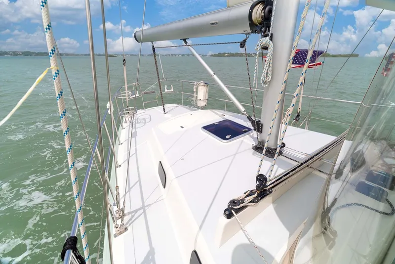 Slide: The Image of Sailing on a 1981 Pearson 530 yacht, clear skies, calm waters. - 30