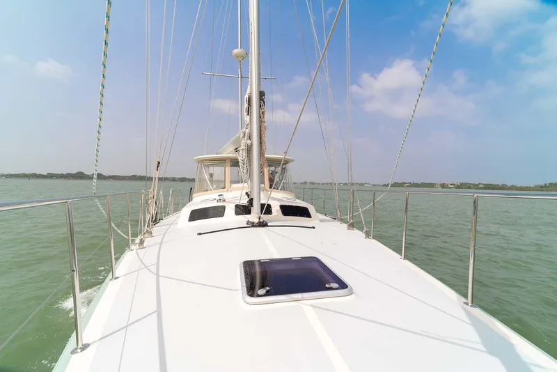 Slide: The Image of Pearson 530 sailboat from 1981 on calm waters under a clear sky. - 31