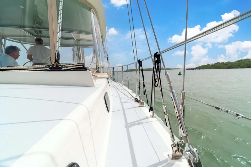 Slide: The Image of Sailing on a 1981 Pearson 530 yacht, clear skies, calm waters. - 36