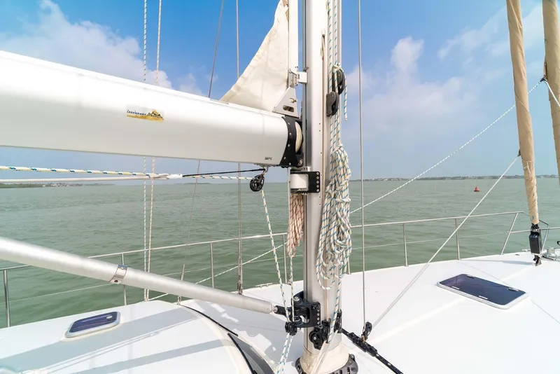 Slide: The Image of Sailing on a 1981 Pearson 530 yacht, calm waters, clear sky. - 37