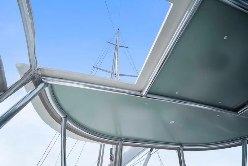 Slide: The Image of View from inside a 1981 Pearson 530 sailboat, showcasing the mast and sky. - 38