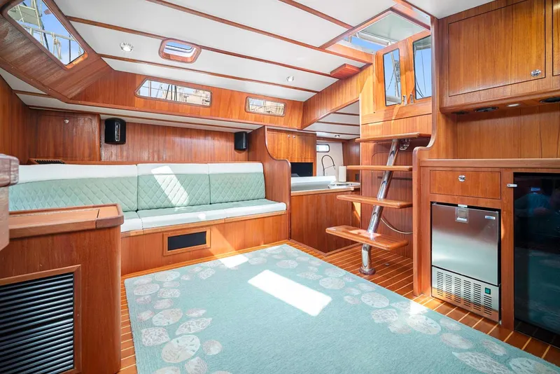 Slide: The Image of Interior of 1981 Pearson 530 yacht with wooden finish and modern amenities. - 4