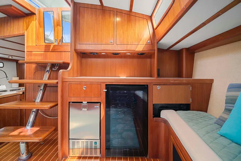 Slide: The Image of Interior of 1981 Pearson 530 yacht with wooden cabinetry and modern amenities. - 5