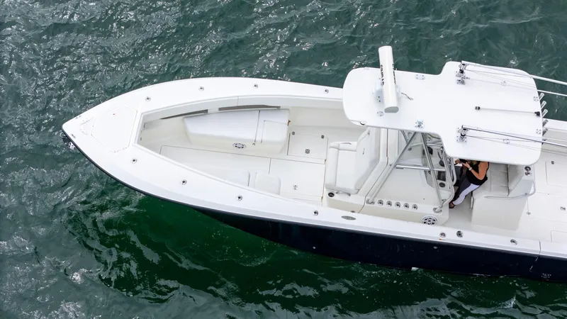 Slide: The Image of Aerial view of 2015 SeaVee 340Z boat on water. - 11