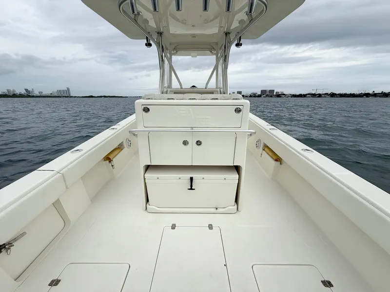Slide: The Image of 2015 SeaVee 340Z boat interior, open deck view on water. - 26