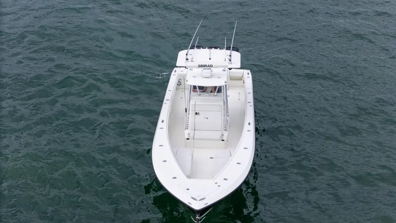 Slide: The Image of 2015 SeaVee 340Z boat on open water, aerial view. - 9