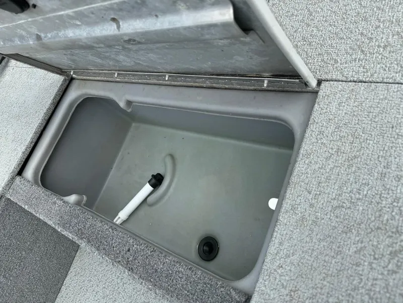 Slide: The Image of Open storage compartment in 2018 Tracker Pro 170 boat. - 15