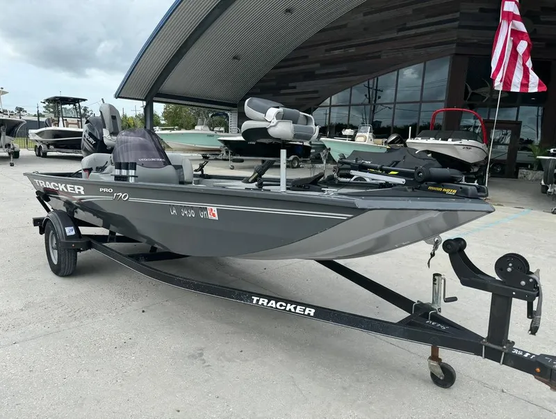 Slide: The Image of 2018 Tracker Pro 170 fishing boat on trailer, parked outside dealership. - 5