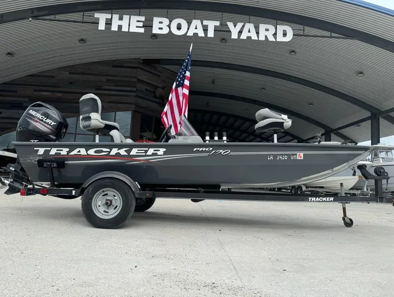 Slide: The Image of 2018 Tracker Pro 170 boat with American flag at The Boat Yard. - 6