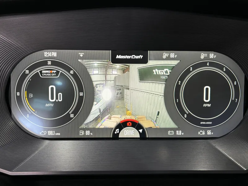 Slide: The Image of 2023 MasterCraft X24 dashboard display with speedometer and RPM gauges. - 14