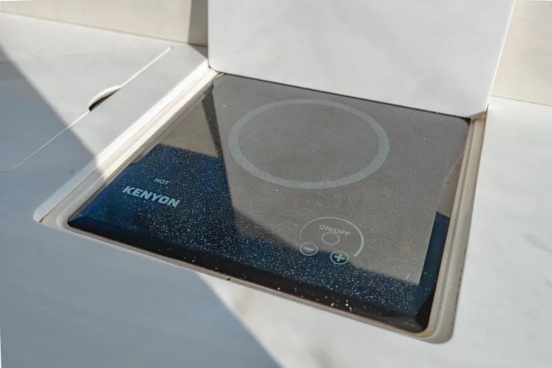 Slide: The Image of Kenyon cooktop on 2021 Regal 36 Grande Coupe yacht. - 17