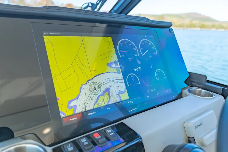 Slide: The Image of 2021 Regal 36 Grande Coupe dashboard with navigation and control displays. - 21