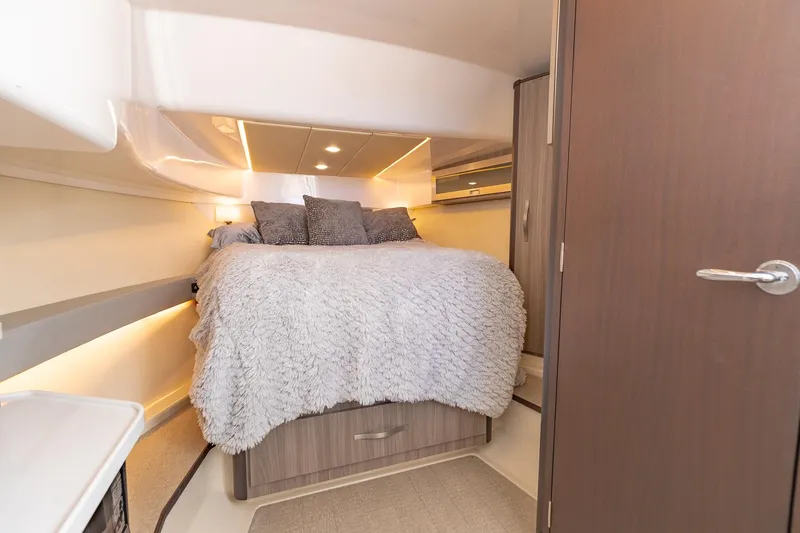Slide: The Image of Luxurious bedroom interior of 2021 Regal 36 Grande Coupe yacht. - 28