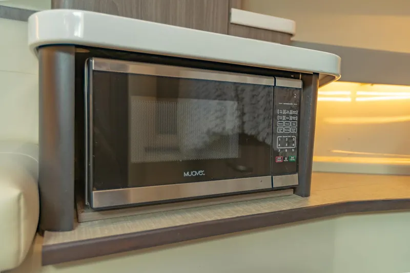 Slide: The Image of Microwave oven in 2021 Regal 36 Grande Coupe yacht interior kitchen. - 32