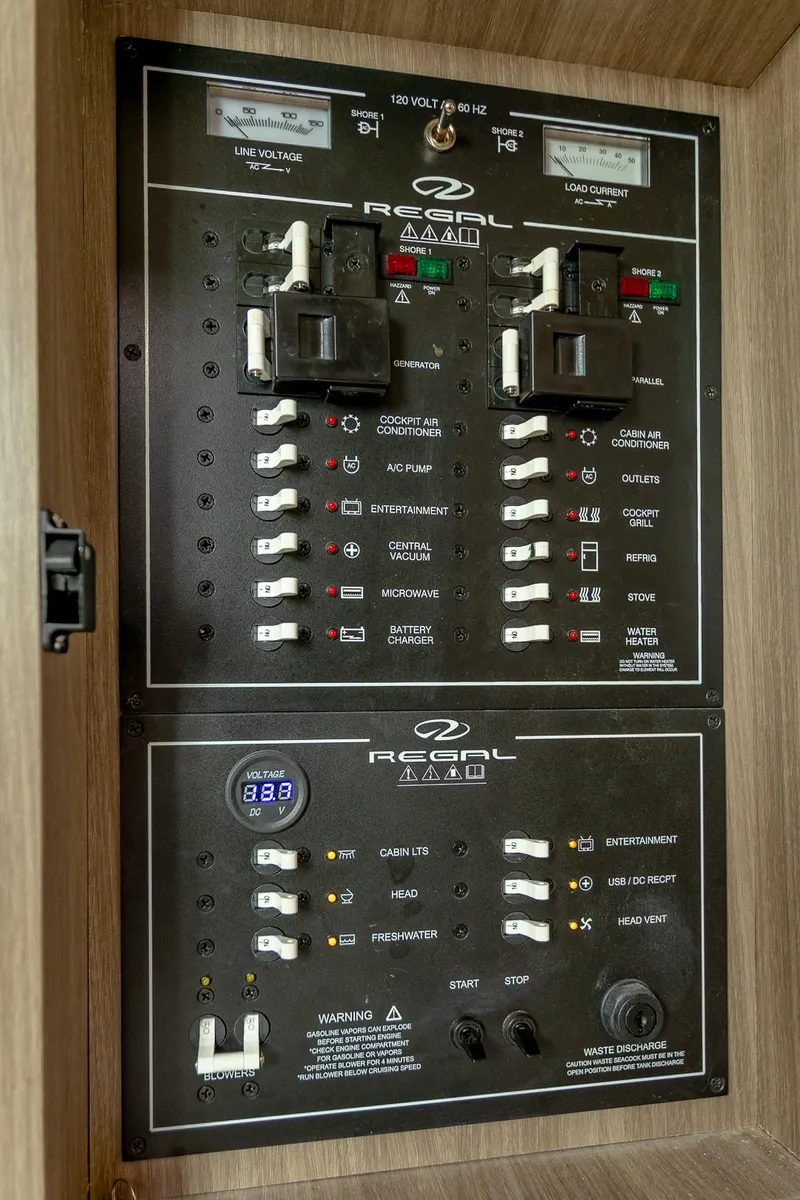 Slide: The Image of Electrical control panel of 2021 Regal 36 Grande Coupe boat. - 34