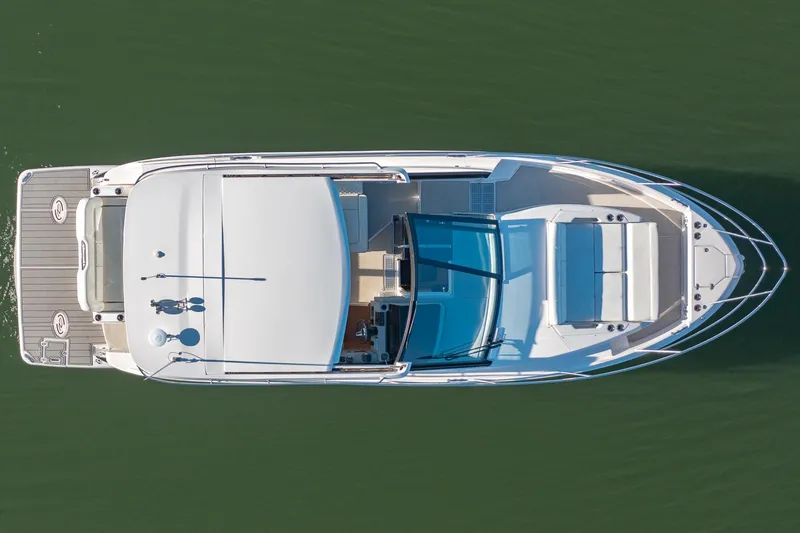 Slide: The Image of Aerial view of 2021 Regal 36 Grande Coupe luxury yacht on water. - 6