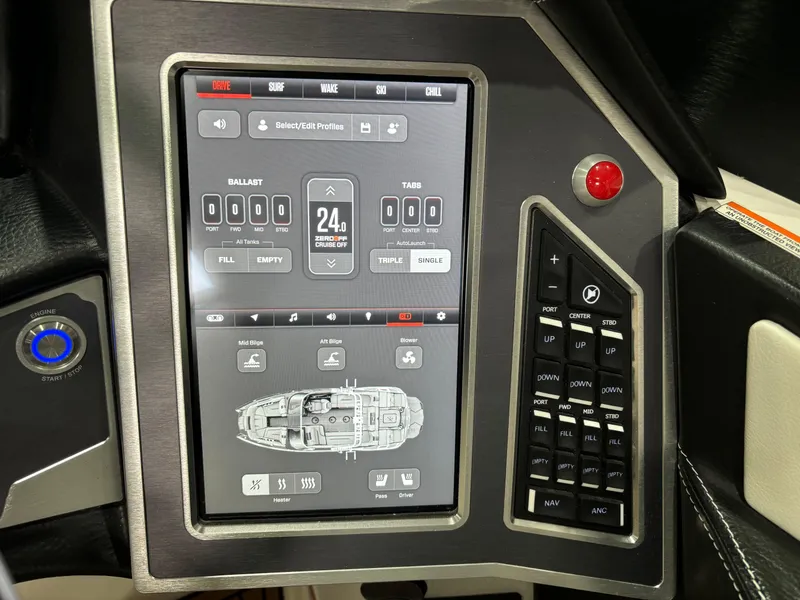 Slide: The Image of 2024 MasterCraft X24 boat control panel with touchscreen interface and navigation buttons. - 16