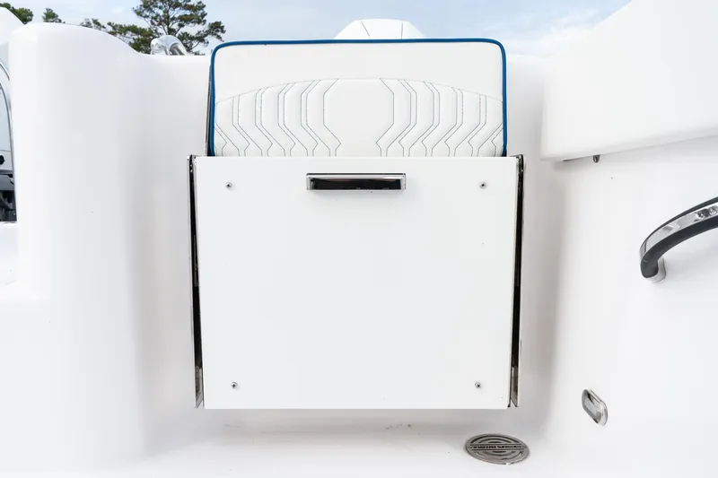 Slide: The Image of 2025 Twin Vee 280 GFX2 CC boat seat with white and blue design. - 17