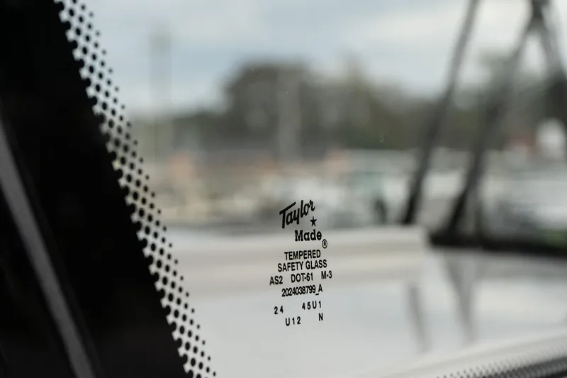 Slide: The Image of Close-up of Taylor Made tempered safety glass on 2025 Twin Vee 280 GFX2 CC. - 31