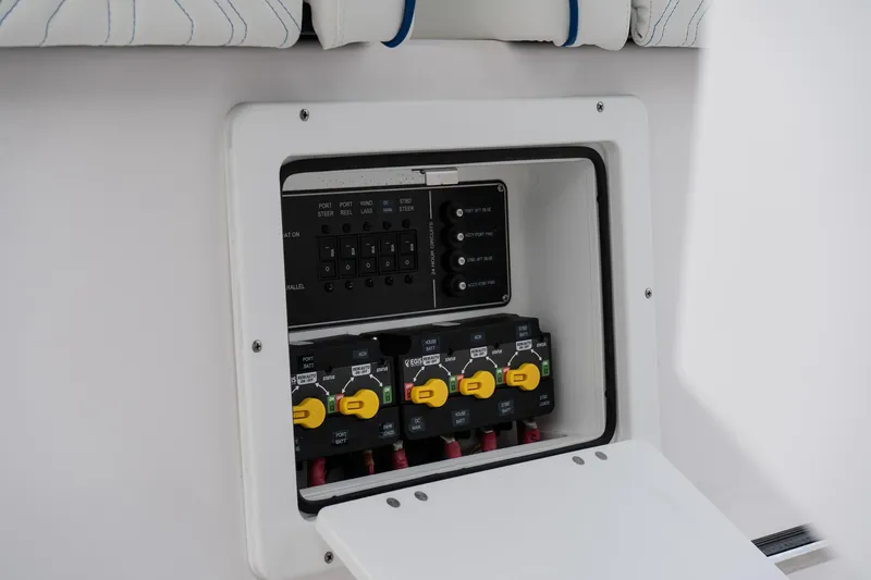 Slide: The Image of Electrical panel of 2025 Twin Vee 280 GFX2 CC boat, featuring circuit breakers. - 37