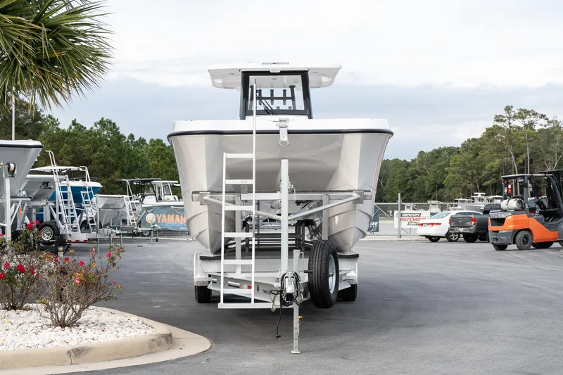 Slide: The Image of 2025 Twin Vee 280 GFX2 CC boat on trailer in parking lot. - 4