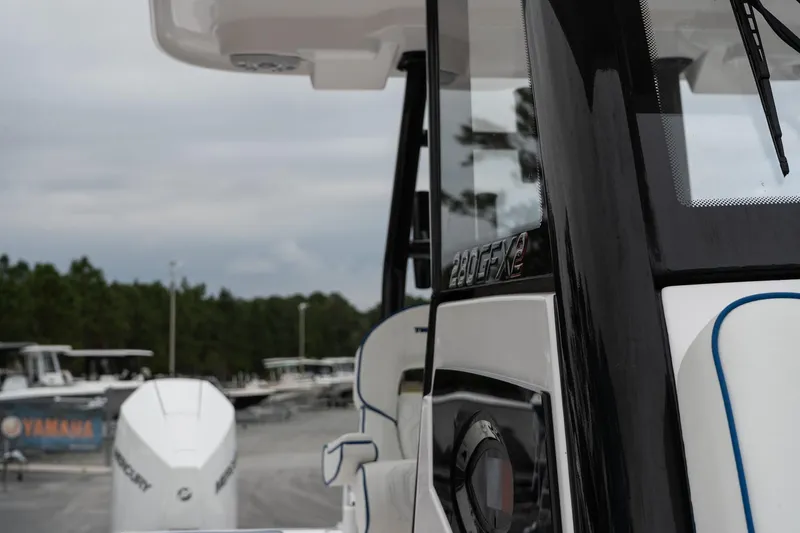 Slide: The Image of 2025 Twin Vee 280 GFX2 CC boat, close-up view, featuring sleek design and modern details. - 49
