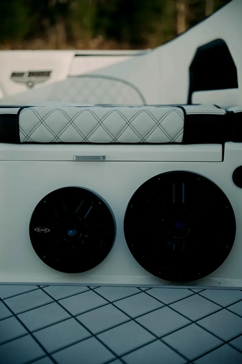 Slide: The Image of Luxury interior of 2021 Deep Impact 399 Sport boat with premium speakers and quilted seating. - 10