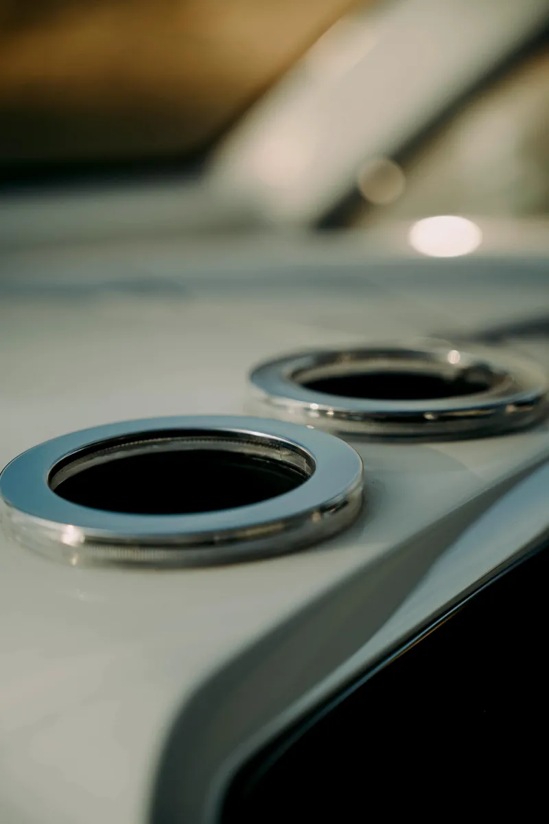 Slide: The Image of Close-up of 2021 Deep Impact 399 Sport boat details, featuring sleek chrome accents. - 13