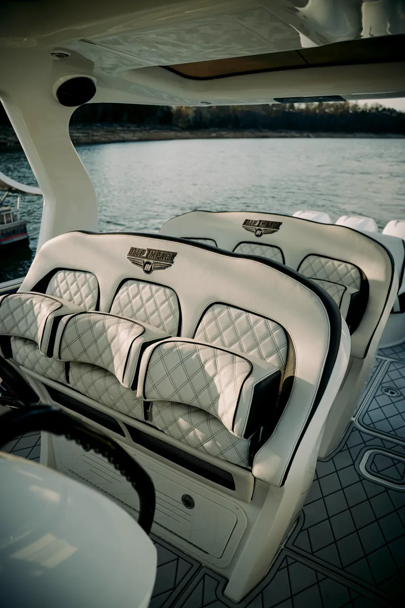 Slide: The Image of Luxury seating on 2021 Deep Impact 399 Sport boat with quilted upholstery. - 14