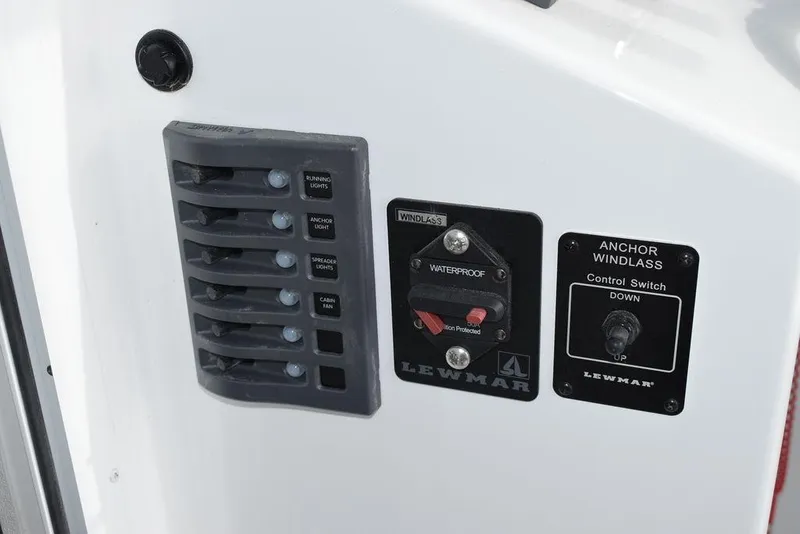 Slide: The Image of Control panel of 2025 Steiger Craft 23 Miami boat with anchor windlass switch. - 16