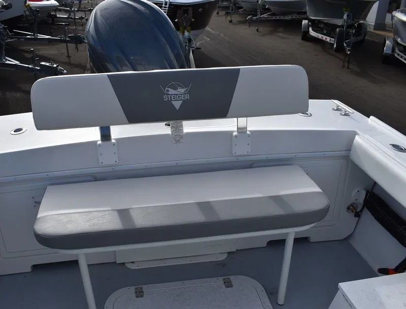 Slide: The Image of 2025 Steiger Craft 23 Miami boat seating area with gray and white upholstery. - 24