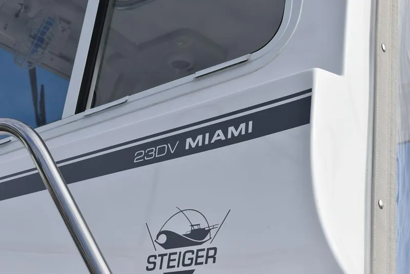 Slide: The Image of 2025 Steiger Craft 23 Miami boat detail with logo and model name. - 27