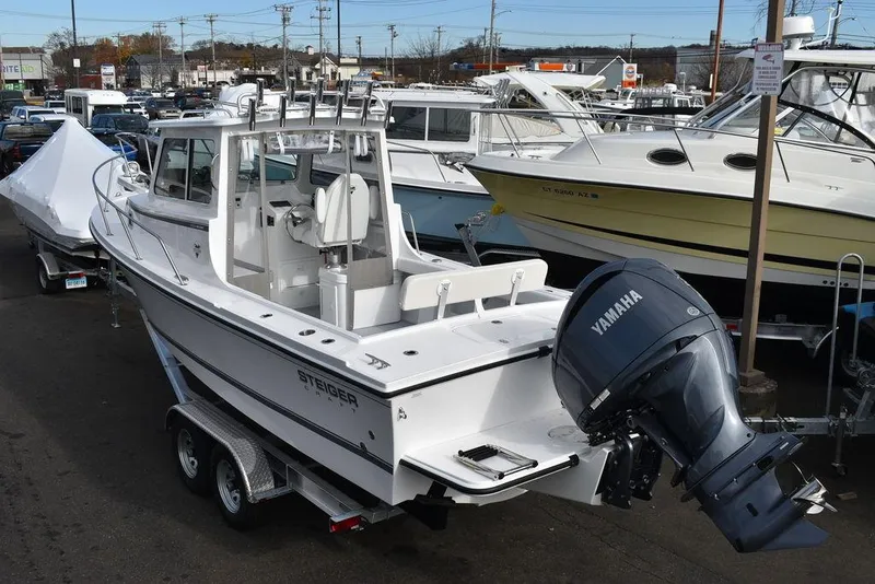 Slide: The Image of 2025 Steiger Craft 23 Miami boat with Yamaha outboard motor in marina. - 3